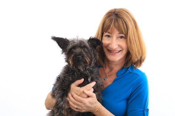 Diane Pollock Territory Partner holding a dog